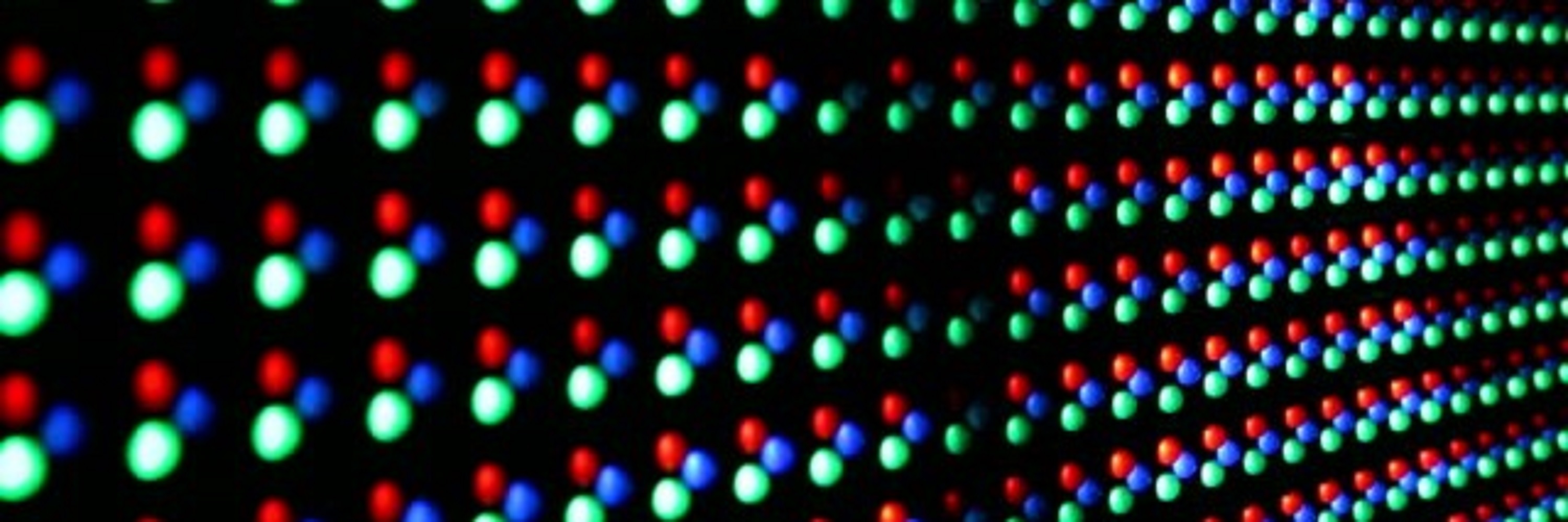 Picture of a wall made of glowing LEDs.